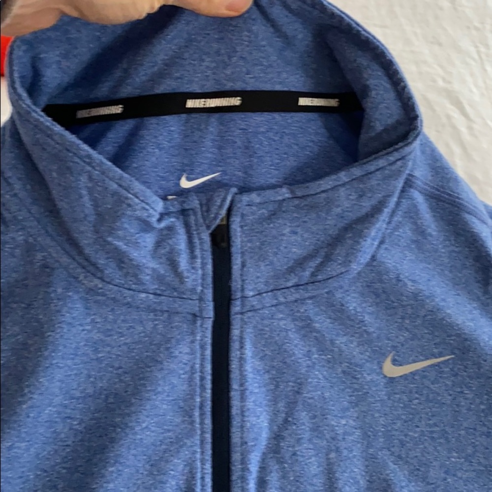 Nike’s men’s running top -higher end NIKE line